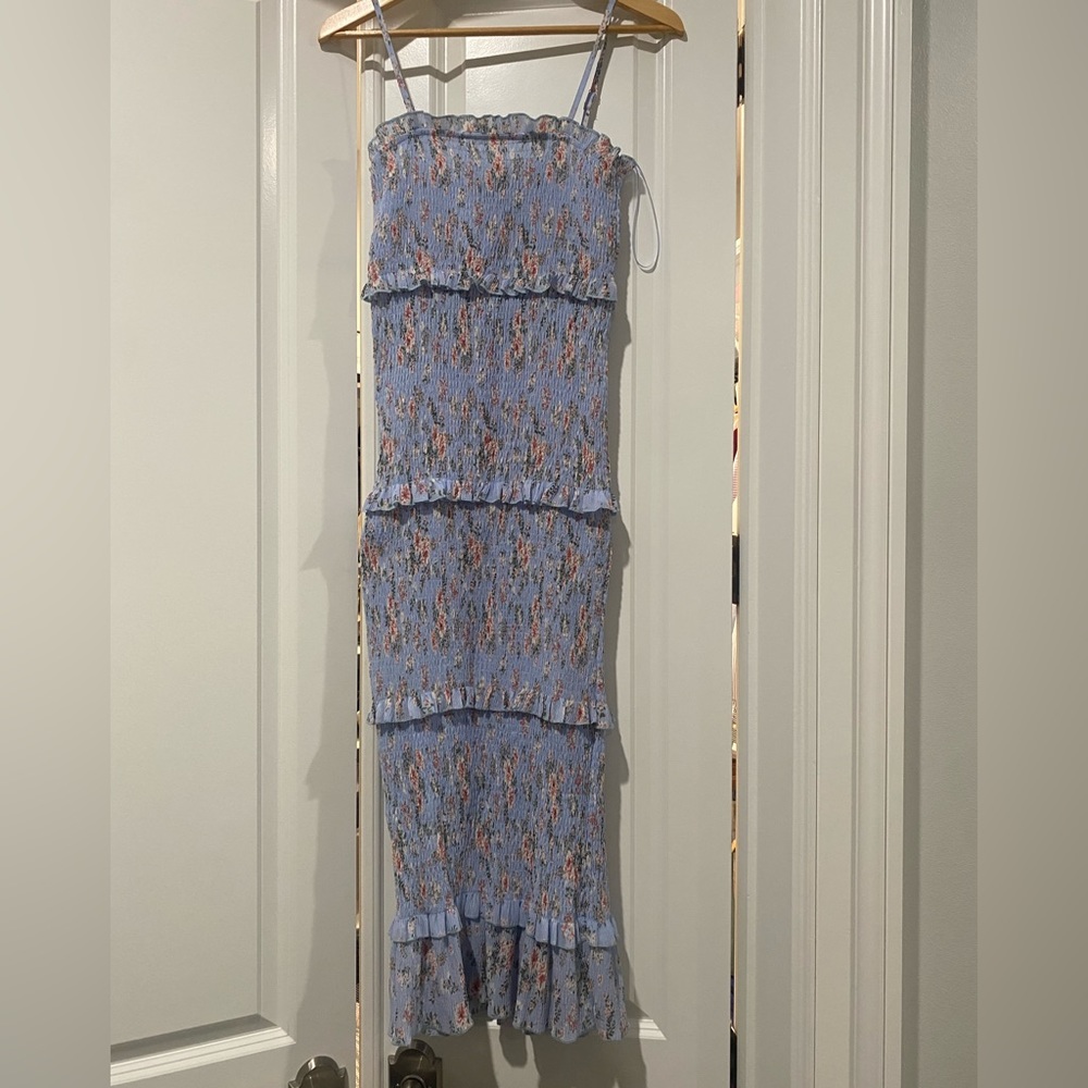 Light blue floral spaghetti strap smocked midi dress. Worn once. Spring